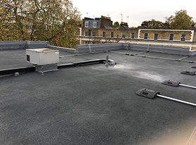 Liquid Rubber waterproofing system with a grey granite finish on a residential block in Camden with a 15 year warranty